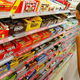 kid at 7-11 looking for candy